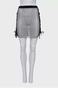 Transparent costume decorated with rhinestones