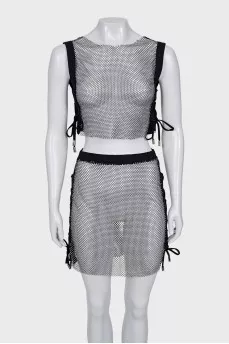 Transparent costume decorated with rhinestones
