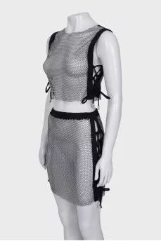 Transparent costume decorated with rhinestones