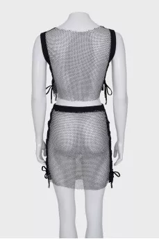 Transparent costume decorated with rhinestones