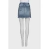 Denim skirt with a ripped effect