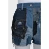Blue denim shorts with a distressed effect