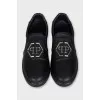 Men's leather slip-ons with a silver logo