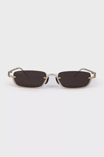Sunglasses with gold frame and logo