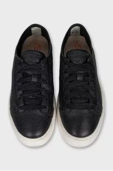 Black leather sneakers with perforations