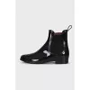 Rubber boots with elastic bands on the sides