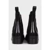 Rubber boots with elastic bands on the sides