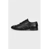 Black shoes with gold decor