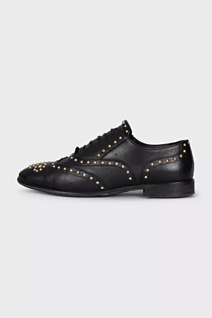 Black shoes with gold decor