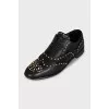Black shoes with gold decor