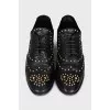 Black shoes with gold decor