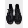 Men's black leather lace-up boots