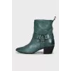 Green leather boots with heels