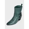 Green leather boots with heels