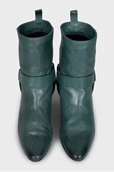 Green leather boots with heels