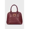 Leather bag with embossed logo
