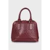Leather bag with embossed logo