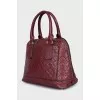 Leather bag with embossed logo