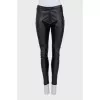 Black leather tapered trousers
