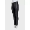 Black leather tapered trousers