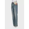 Asymmetrical button-down jeans