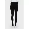 Leggings with lightning and buttons below