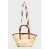 Raffia bag with leather inserts