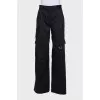 Wide black trousers with patch pockets
