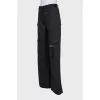 Wide black trousers with patch pockets