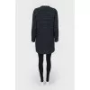 Knitted coat with patch pockets with tag