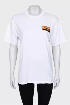 T-shirt decorated with a patch