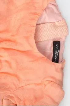 Children's peach dress with short sleeves