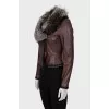 Fitted leather jacket with fur collar
