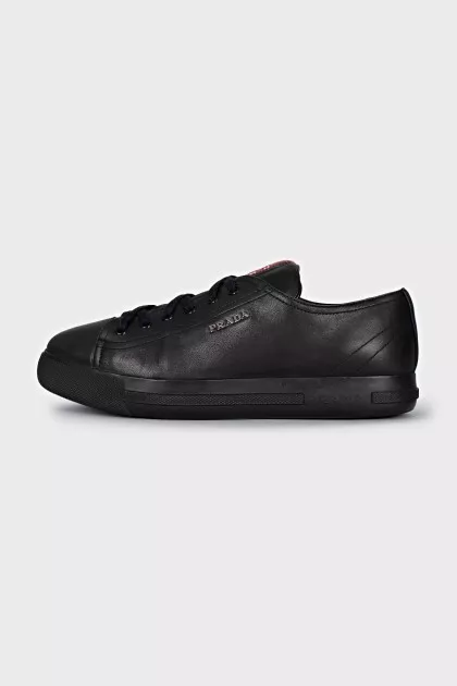 Leather sneakers with a silver logo