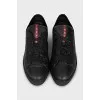 Leather sneakers with a silver logo