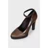 Brown shoes with a strap