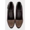 Brown shoes with a strap