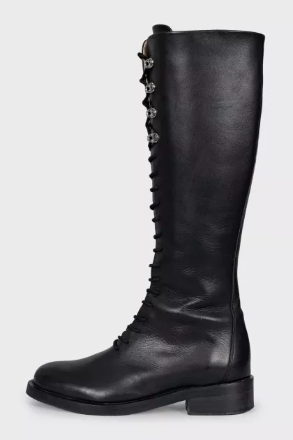 Black boots with a zipper and laces