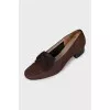 Brown shoes with a bow