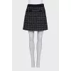 Tweed black suit with a skirt