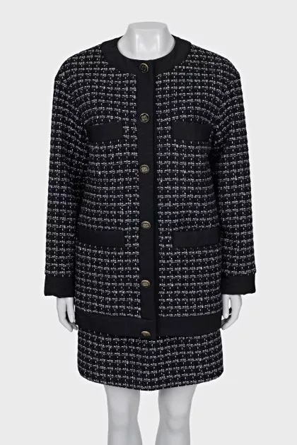 Tweed black suit with a skirt