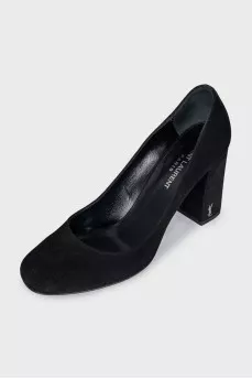 Suede shoes with a silver logo