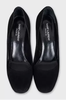 Suede shoes with a silver logo