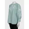 Loose striped blouse with perforations