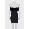 Sleeveless dress decorated with fur