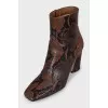 Animal print embossed ankle boots