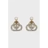 Stud earrings with the brand logo