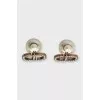 Stud earrings with the brand logo