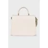 Leather bag with gold decor