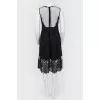 Dress with a transparent insert and feathers